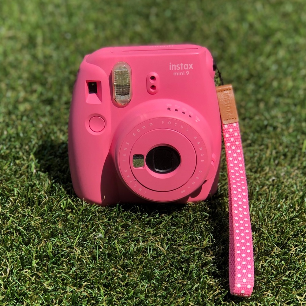 Instax mini in flamingo pink with polka dot strap